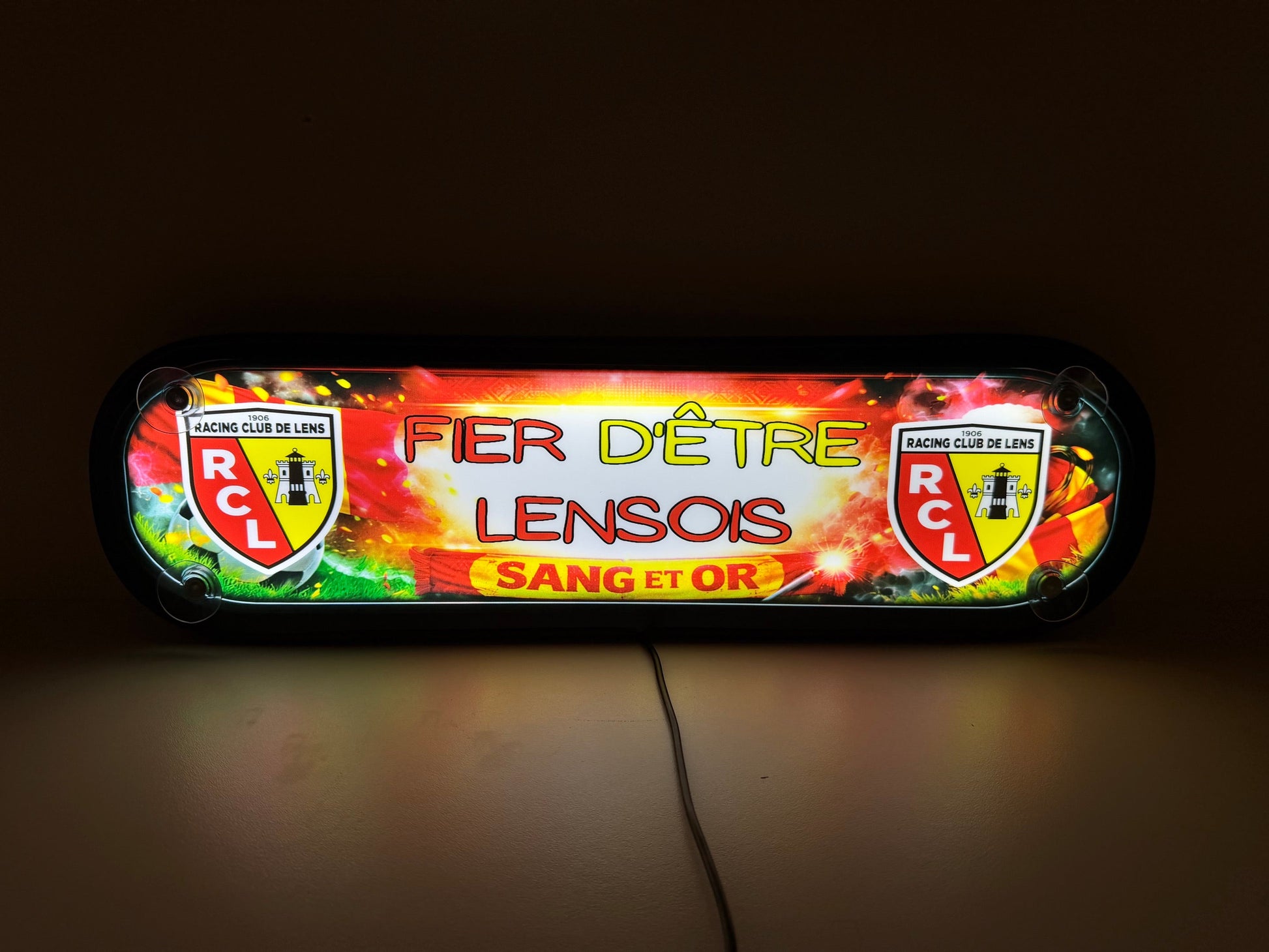 Plaque lumineuse RC Lens en cabine camion